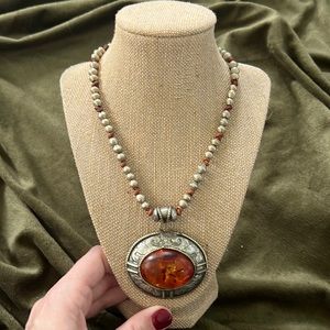 Handmade Tibetan silver necklace with large amber stone pendant!